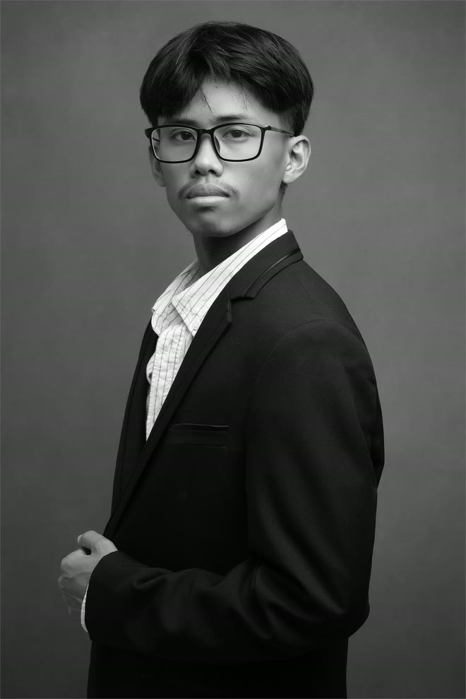 Daniel Rodriguez, monochrome studio portrait.